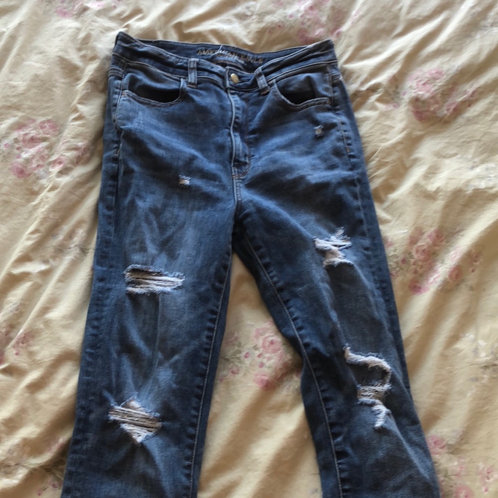 American Eagle Darker washed ripped jeans.